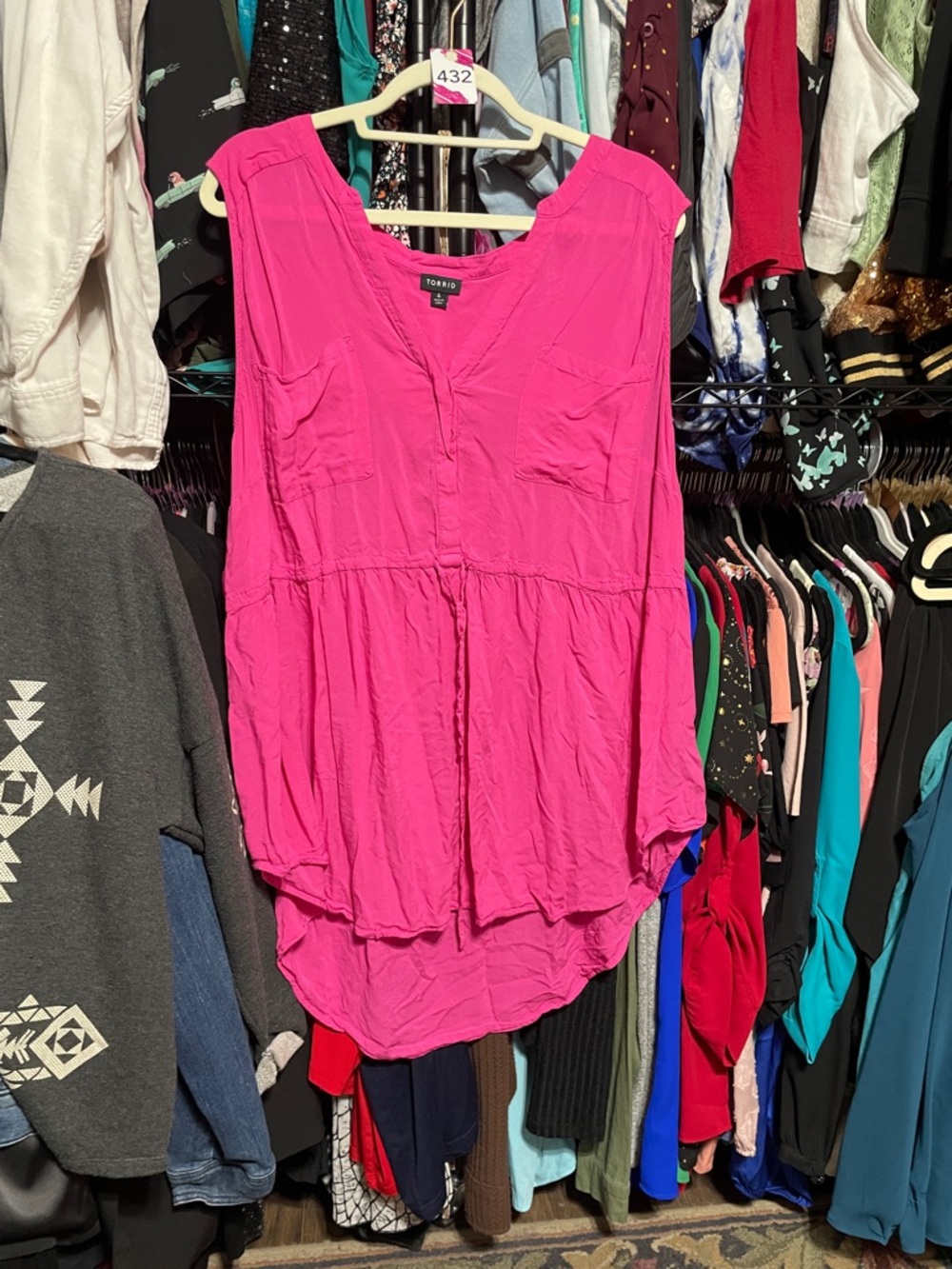 #432 size 4 Torrid Pink Sleeveless V-Neck Peplum hi low Top